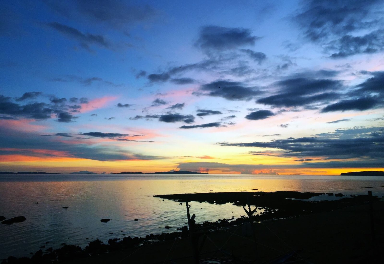 Sunset over the calm coastline of Donsol Bay, Sorsogon