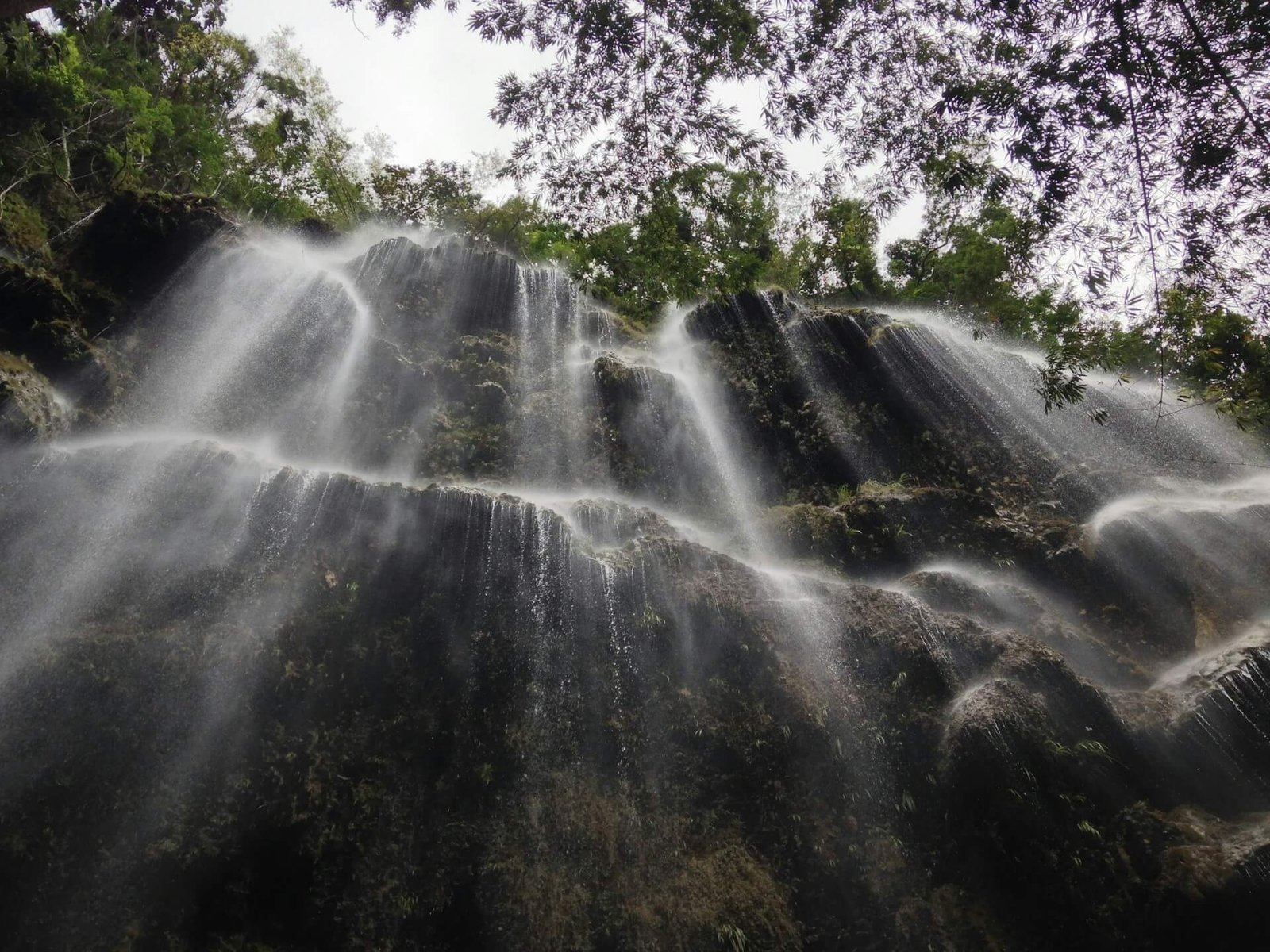 Wide curtain of water at Tumalog Falls in Oslob, southern Cebu